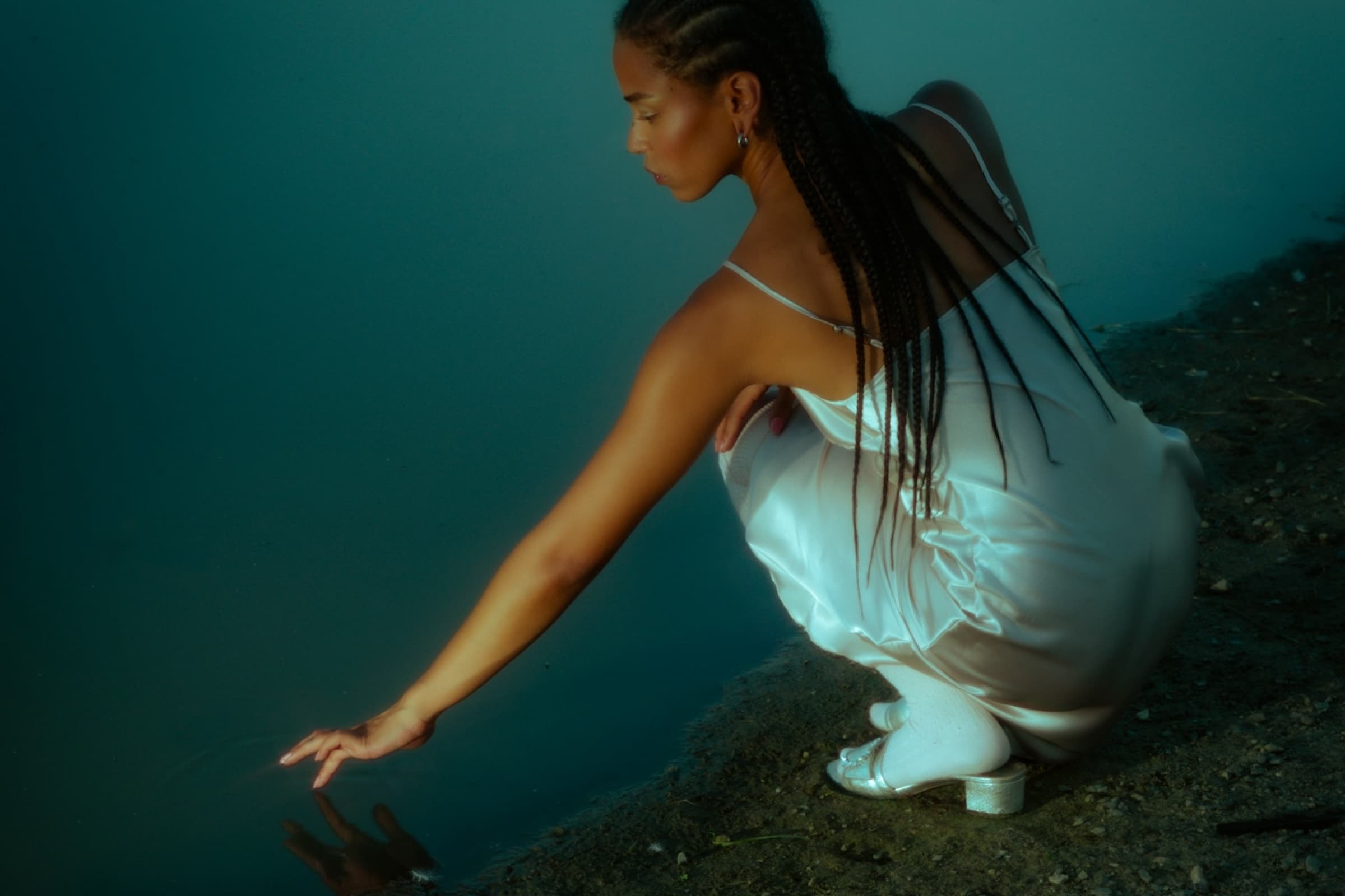 woman touching water